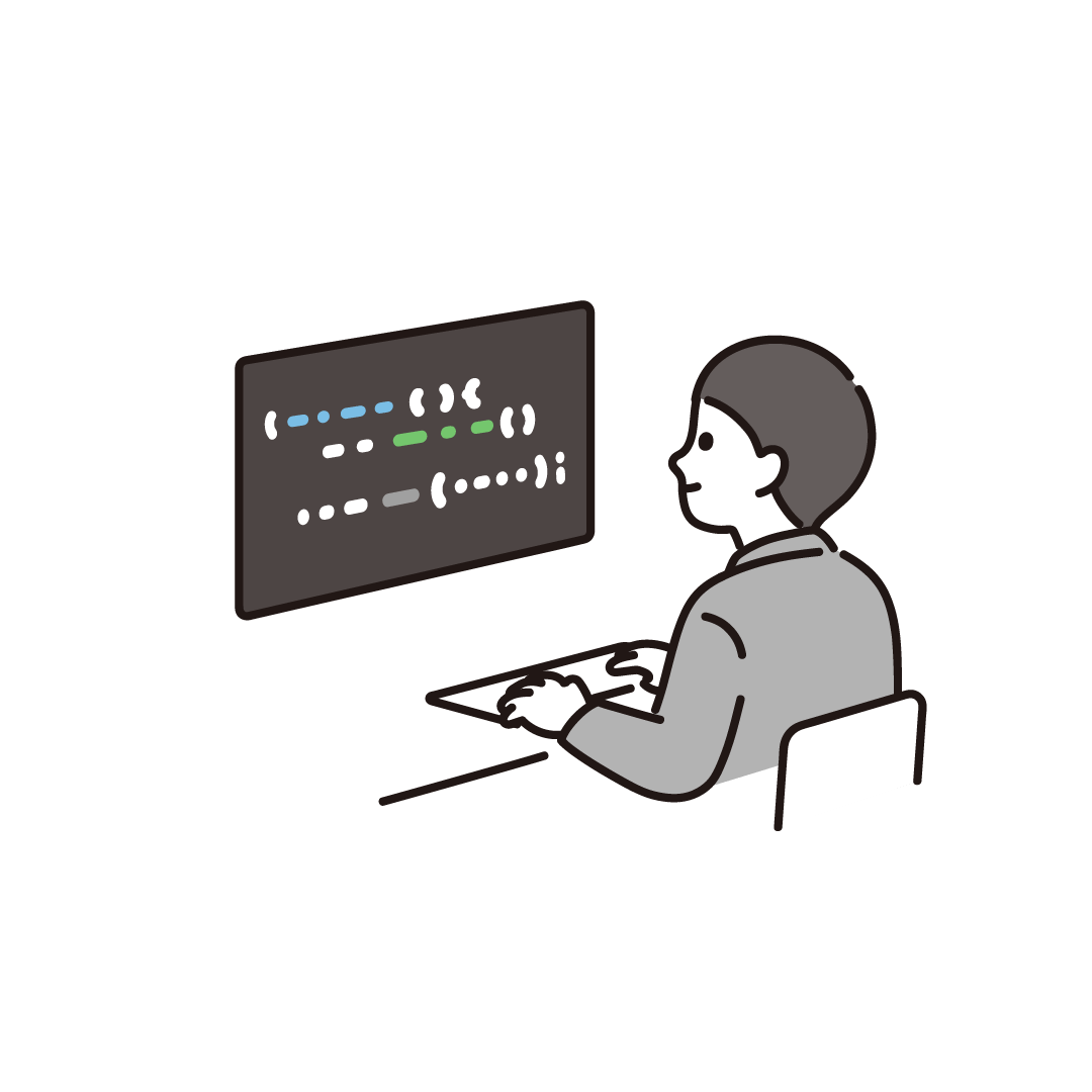 パソコンでプログラミングをするエンジニア